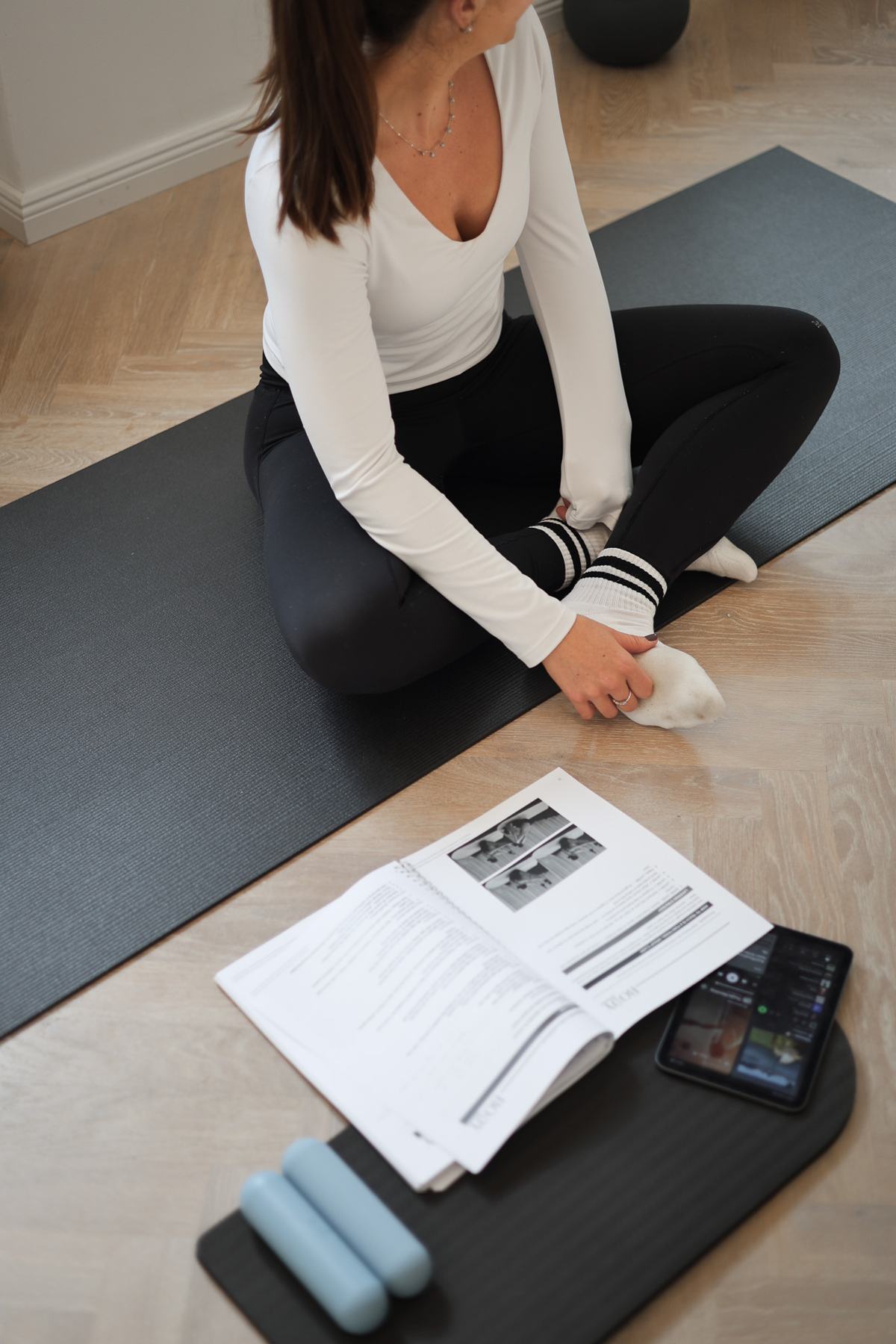 Students practising Mat Pilates on a Body Form Education practical day