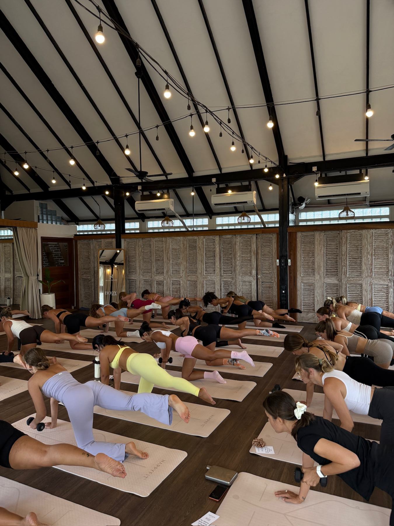 Students practising Mat Pilates on a Body Form Education practical day