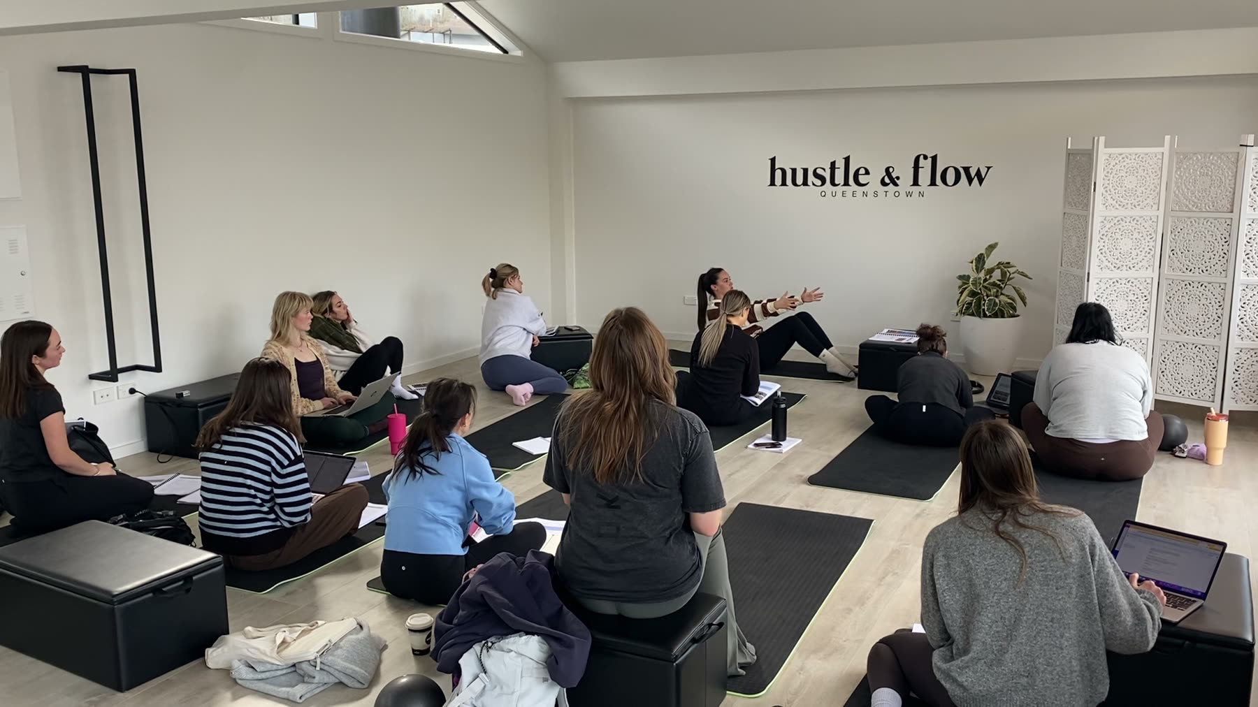 Students practising Mat Pilates on a Body Form Education practical day